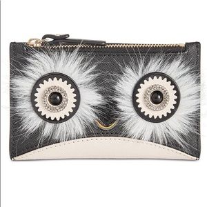 Kate Spade “Dashing Beauty” Bifold Wallet.